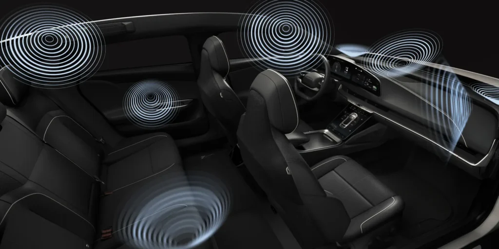Lucid Air interior with speaker locations shown.