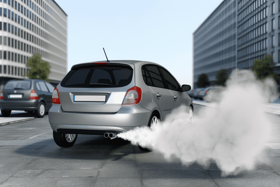 What causes white smoke from a vehicle's exhaust?