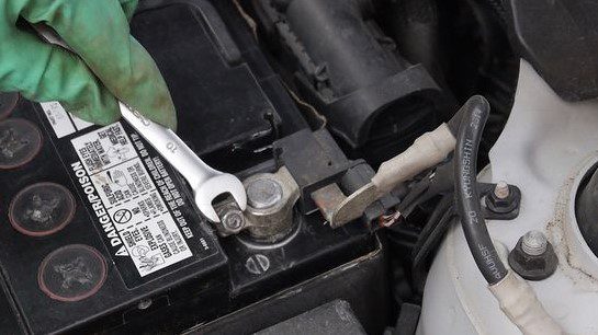 Attaching cables to the new car battery