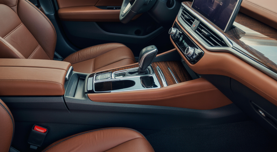 Close-up of luxury car interior with leather and wood trim.