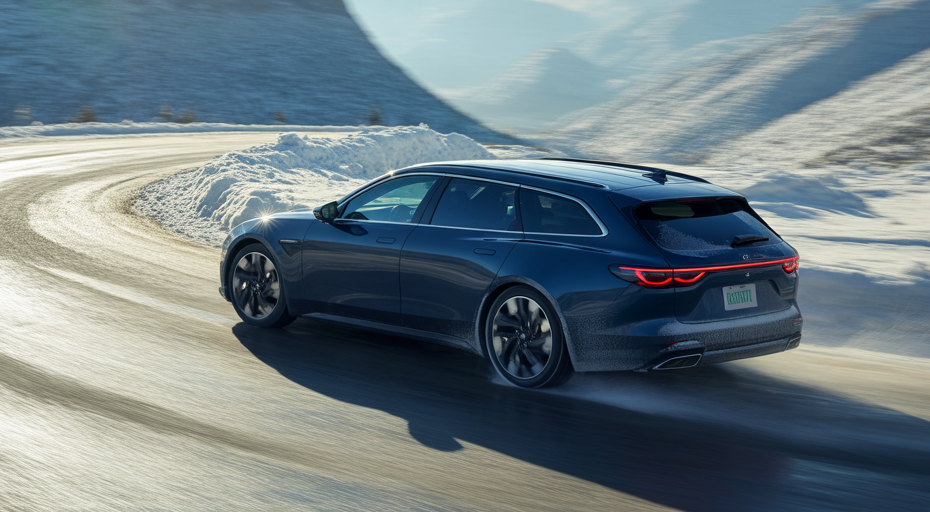 Capable wagon driving on snowy mountain road