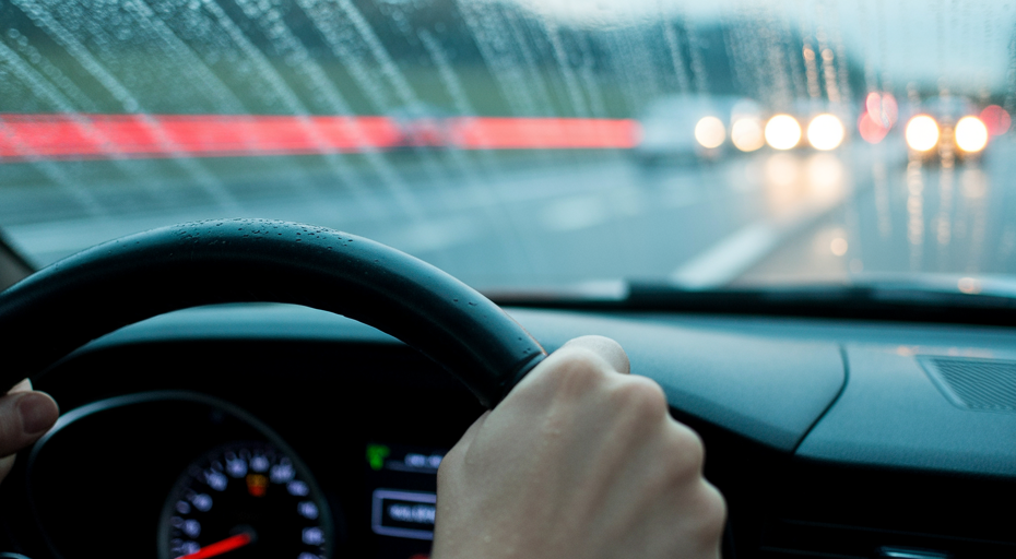 Flashing traction control light on car dashboard