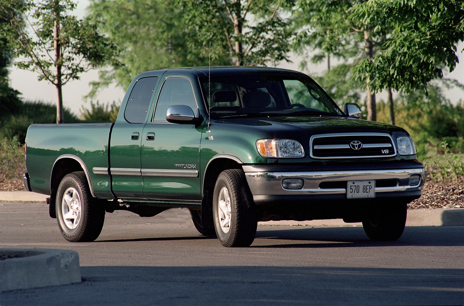 Green 2000 Toyota Tundra Access Cab seen in a front three-quarter view.